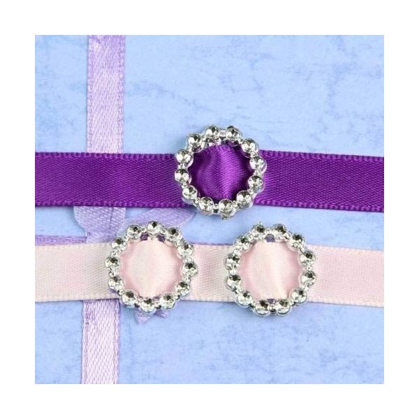 Boucle passe ruban ronde 2 couleurs au choix (sachet de 100) Boucle passe ruban ronde 2 couleurs au choix (sachet de 100)