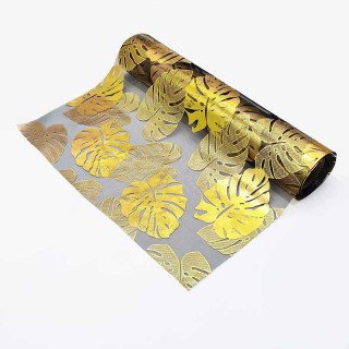 chemin de table organza noir feuille tropicale or